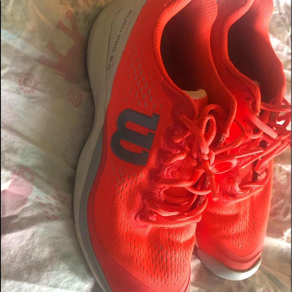 Women’s tennis court shoes.